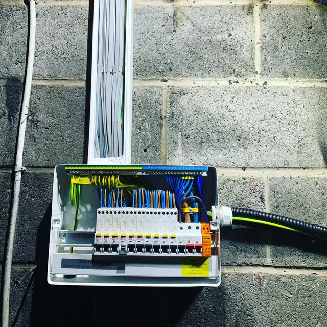 Consumer unit on a block wall