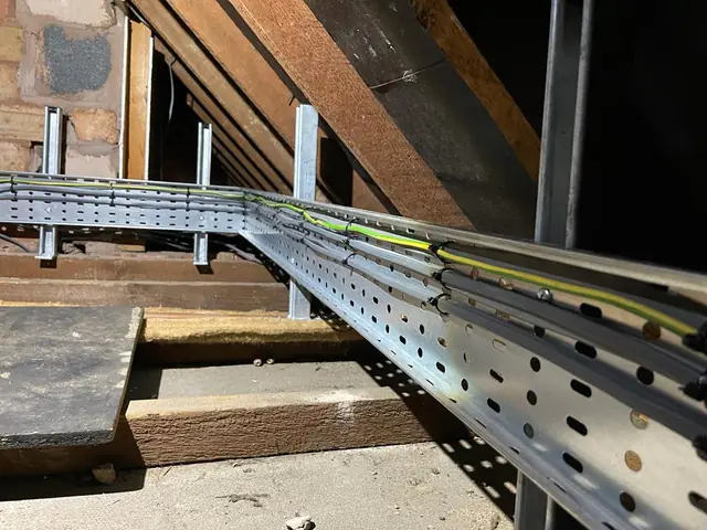 Cable tray run through a loft